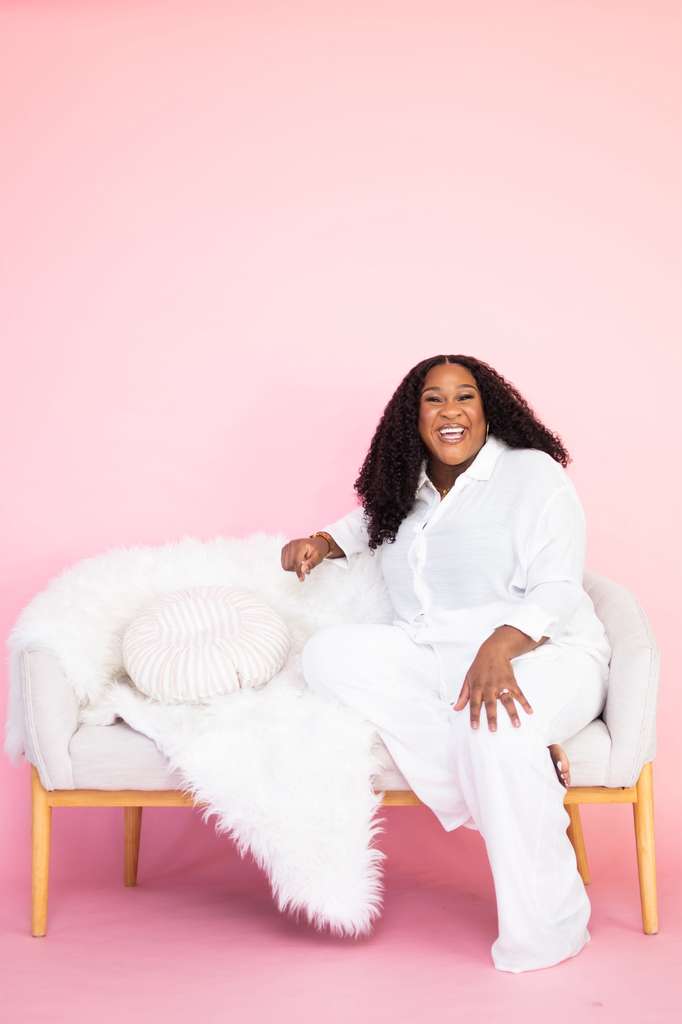 Tomilade Adebari smiling